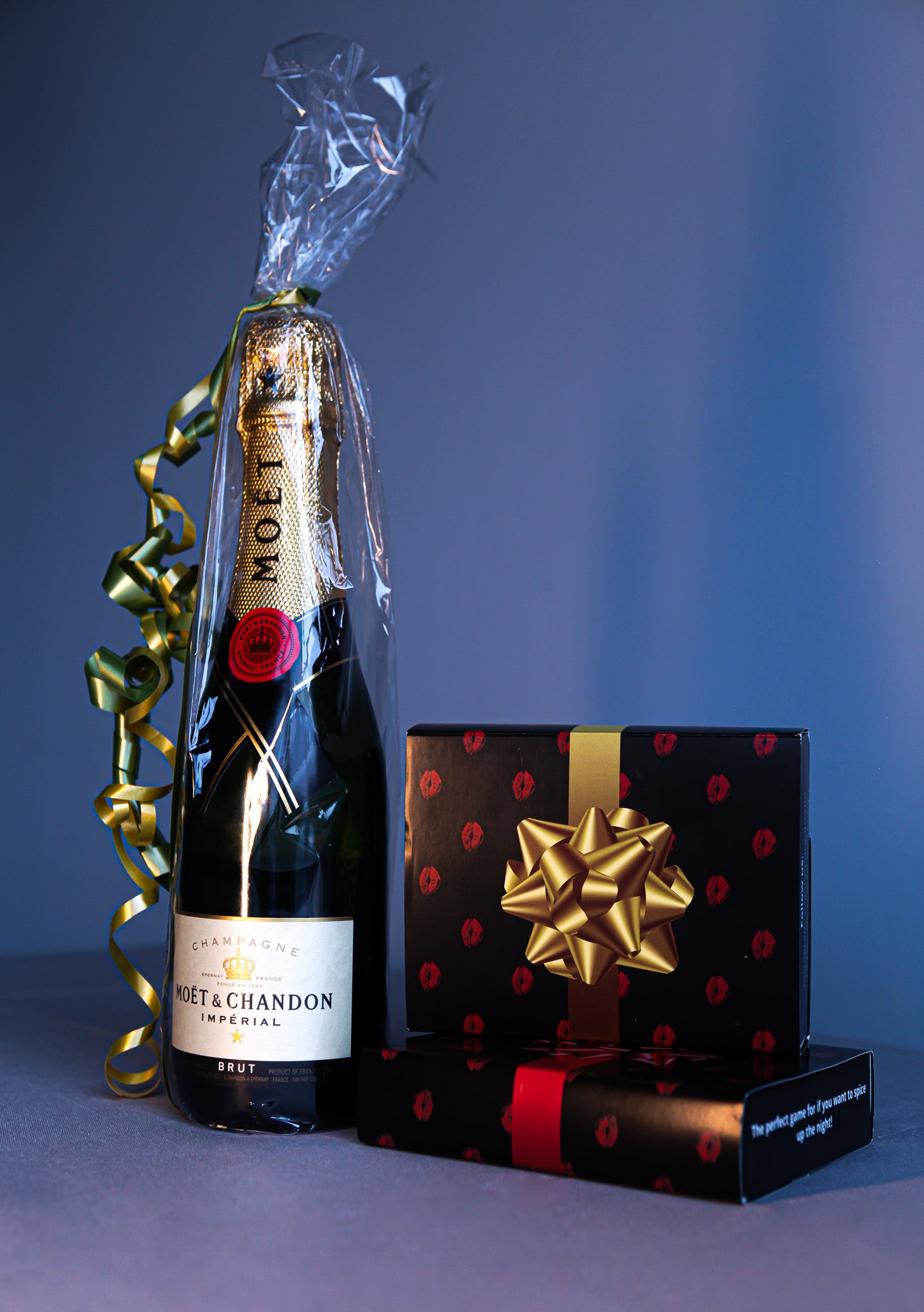 Moet & chandon bottle gift with a drinking game in luxurious gift packaging